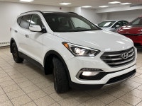Powerful confidence wrapped in Frost Whitethis 2018 Hyundai Santa Fe 2.4 SE All-Wheel Drive SUV is e... (image 1)