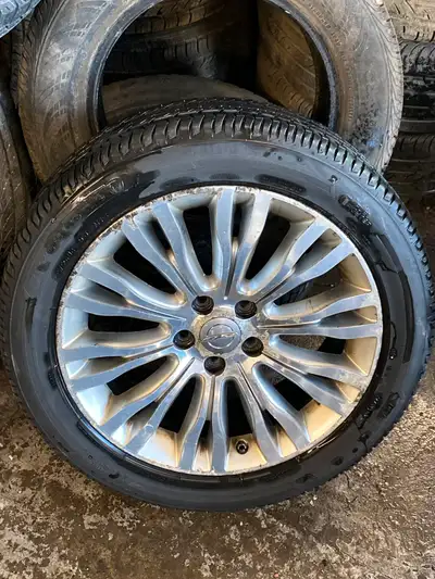 225/50/18 firestone all season tires on Set in Chrysler rims will fit Chrysler 300 chrysler 200 dodg...