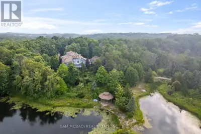 Welcome to 9 Flaherty Lane, a breathtaking custom estate nestled on over 10.6 acres in one of Caledo...