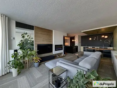 Superbe condo au style CONTEMPORAIN ENTIÈREMENT RÉNOVÉ avec stationnement intérieur à l'Île-des-Soeu...