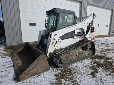 2014 T870 Bobcat skidsteer, ISO/H pattern joystick, two speed attach, enclosed cab, A/C, 17 in track...