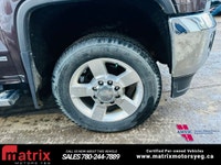 The 2016 GMC Sierra 2500HD 4WD Crew Cab 153.7in. SLT is a heavy-duty pickup truck with a standard 6.... (image 6)