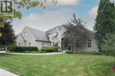 Rarely Offered in Prestigious Kiwanis Park! This exceptional custom-built stone residence by award-w...
