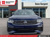 Experience refined driving with the 2024 Volkswagen Tiguan SE R-Line Black, now available at Sean Sa... (image 2)