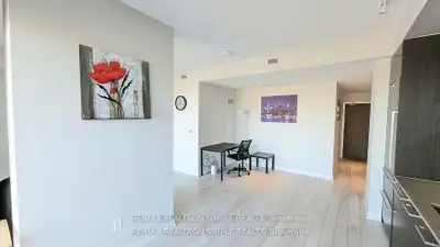 Large one-bedroom plus open den with an unobstructed east view at Opus Condo. 698 SF + large balcony...