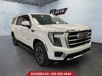 The 2025 GMC Yukon XL Elevation 4WD commands attention with extended-length presence, bold monochrom... (image 6)