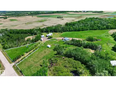 Situated on 19.99 acres, this exceptional acreage is perfectly set up for horses with fenced and cro...