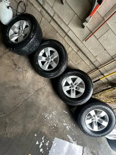 DODGE RAM RIMS & TIRES 17 inch ALL SEASON TIRES WITH 68% Thread Life (Yokohama) GOOD FOR ATLEAST A S...
