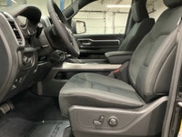 The 2026 Ram 1500 Big Horn 4x4 Crew Cab in a striking black exterior combines rugged durability with... (image 9)