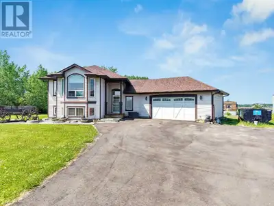 Discover peaceful country living with city convenience at this beautifully maintained acreage, just...