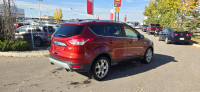 Our 2015 Ford Escape Titanium in Sunset Orange is in stock and ready for your driveway! Call to book... (image 4)