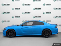 The 2023 Dodge Charger Scat Pack 392 in striking blue with a robust rear-wheel drive offers a dynami... (image 3)