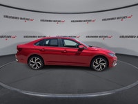 // ACCIDENT FREE!! // // SINGLE OWNER! // Finished in red with a black interior, this 2026 Volkswage... (image 8)