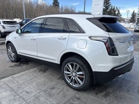 | UltraView Sunroof | Bose Performance Series Audio | Head-Up Display | HD Surround Vision | Heated... (image 5)