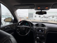 The 2013 Buick Enclave Premium AWD is a full-size luxury crossover that underwent a significant refr... (image 9)
