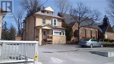 Used car Dealership, front yard with second floor, 3 offices, kitchen, full bathroom, and large room...
