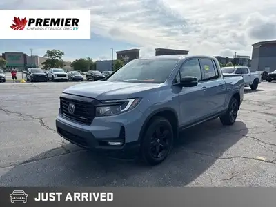 Command the road in this striking 2022 Honda Ridgeline Black Edition, equipped with a practical hard...