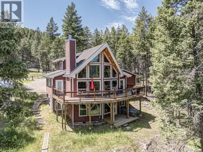 Your Lake Koocanusa Retreat — Now at a NEW PRICE with a FRESH NEW LOOK! This turnkey 4-bed, 4-bath m...