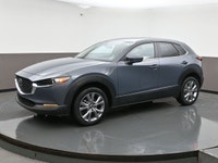 The 2024 Mazda CX-5 GS is praised for its fun driving experience, engaging performance, and high-qua... (image 3)