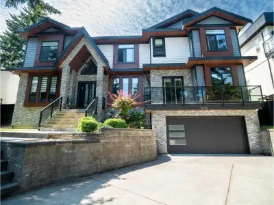 Nestled in the prime, highly coveted neighborhood of East Newton, this custom-built luxury estate of...