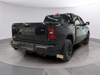Step into the future with the striking 2026 Ram 1500 Sport 4x4 Crew Cab 57 Box finished in a bold bl... (image 4)