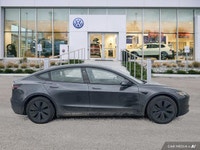 This Tesla Model 3 delivers a Electric engine powering this Automatic transmission. Window Grid Ante... (image 5)