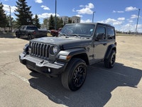 This Jeep Wrangler delivers a Gas/Electric V-6 3.6 L/220 engine powering this Automatic transmission... (image 2)