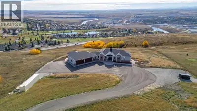 Nestled on 11.76 acres of pristine land, this magnificent 4500 SF walk-out bungalow offers breathtak...