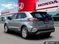 Command the road and embrace adventure in this sophisticated 2023 Ford Edge SEL, striking in Silver.... (image 3)