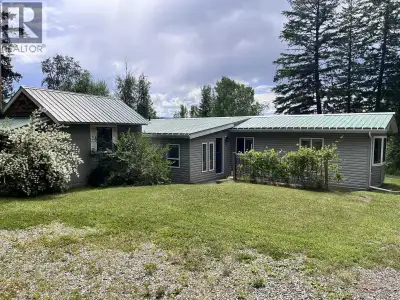 This sweet little acreage is so private and has a million dollar view! 3 beds/ 1.5 Baths with extra...