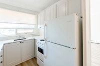 Amenities: Renovated Suites • Quiet Building • Dog Wash Station • Solar Panels Suite & Building: Spa... (image 8)