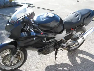 sonic cycle has a 2000 honda vtr - 1000 teft repo parts bike . runs nice has two brothers slip on pi...