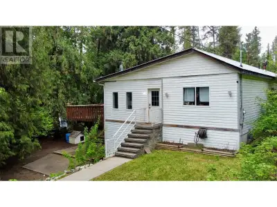 Immaculate Christina Lake residence set on 0.81 acres with a double carport, workshop with 220v plug...