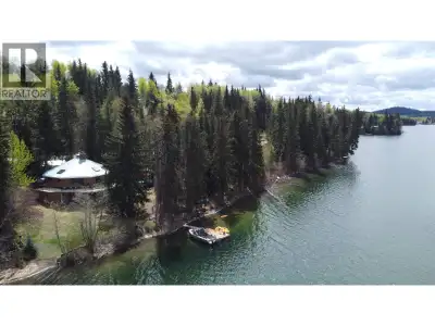 Approximately 200' of clean low-bank gravel lakefrontage with a private dock, tucked into a quiet ba...