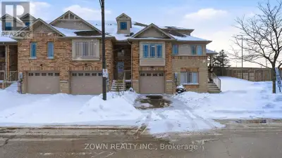 Welcome to a bright and beautifully maintained end-unit freehold townhome that truly feels like home...