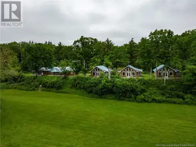 Welcome to the The Old River Lodge with 13.81 acres of fishing & adventure nestled on the famous ban...