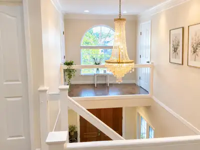 This bright, spacious upper-floor bedroom has its own private full ensuite bathroom in a well-mainta...