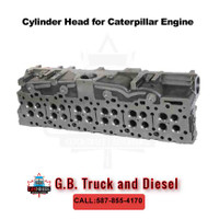 1835296  Loaded cylinder head of C15 engine.