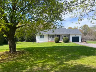 Located between Brighton and Colborne Ont., This is an Exceptional Custom Built Country Raised Bunga...