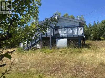 Once a well-loved country property, this quaint 6.57-acre acreage near Bridge Lake is ready for some...