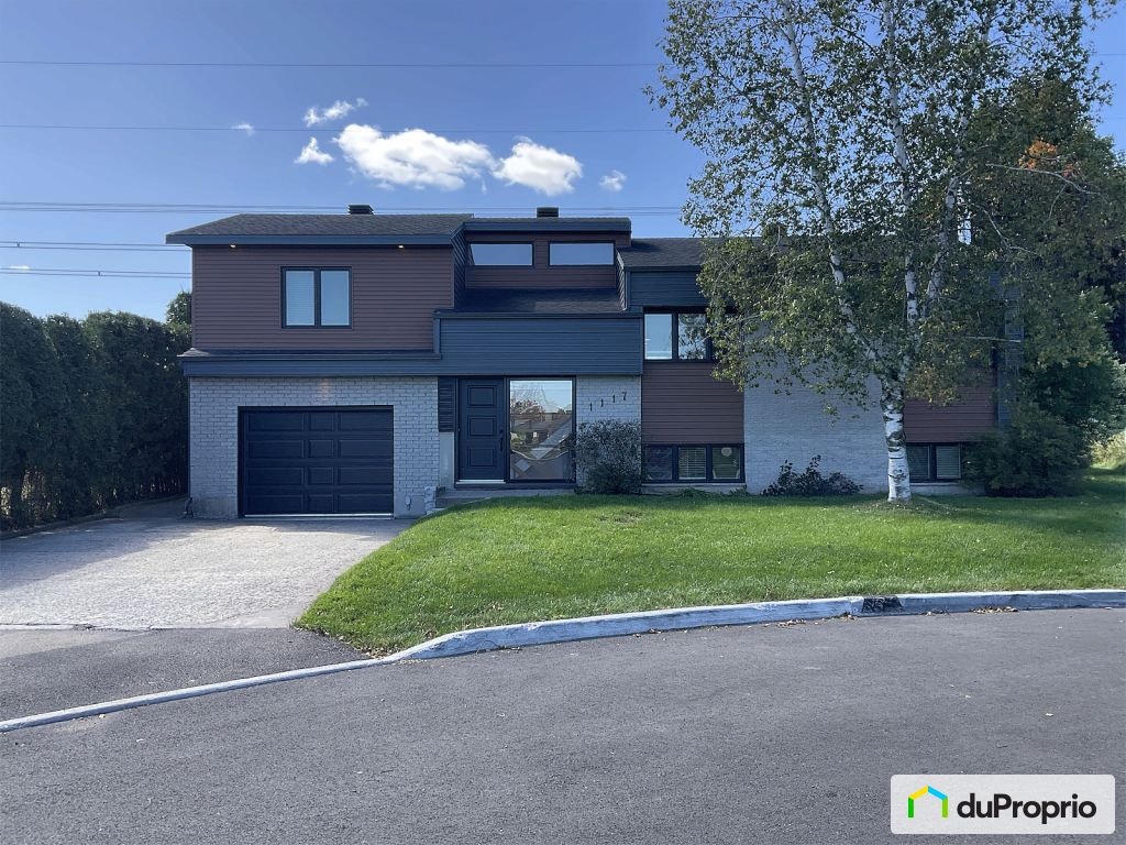 $649,000 - Bungalow for sale in St-Jean-Chrysostome — photo 1