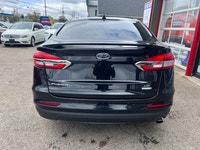 HERE IS A NICE CLEAN ACCIDENT FREE FORD SEDAN FOR YOU IT LOOKS AND DRIVES GREAT AND SOLD CERTIFIED C... (image 4)