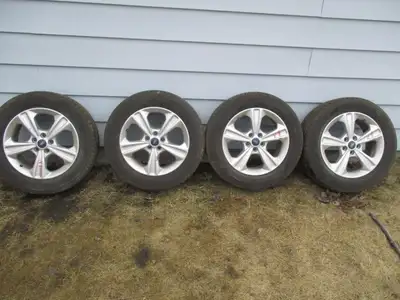 4 Goodyear Assurance WeatherReady all weather tires. - Tire size is 235/55/17 - Close to new tread r...