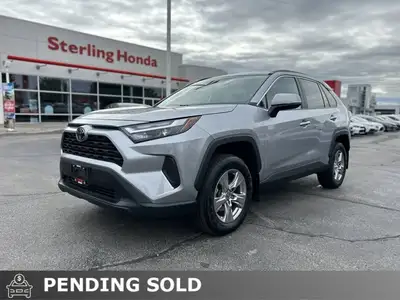 Experience effortless control and adventure in this 2023 Toyota RAV4 XLE, boasting a sleek Midnight...