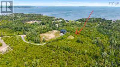 Imagine building your dream home or the perfect coastal getaway on this beautiful property located o...