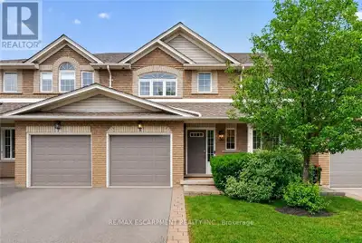 Welcome to this exceptional townhome in Burlington's sought after Millcroft Community, backing onto...