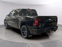 Experience the power and style of the 2026 Ram 1500 Sport, a striking black 4x4 truck designed to ha... (image 2)