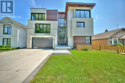 Breathtaking 3 storey custom-built luxury home with main floor accessory suite, ideally situated in...