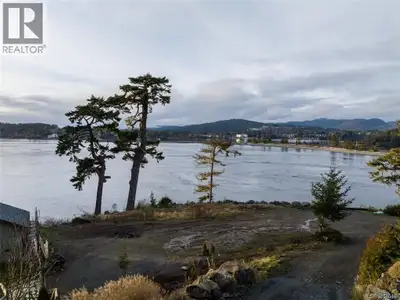 Welcome to 7120 Friendship Lane at the Exclusive Silver Spray Marina Estates—a rare offering for tho...