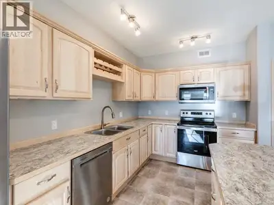 Gorgeous townhome built by Whitewater Homes! End unit, Easterly-facing backyard & holds a 'Super Gre...